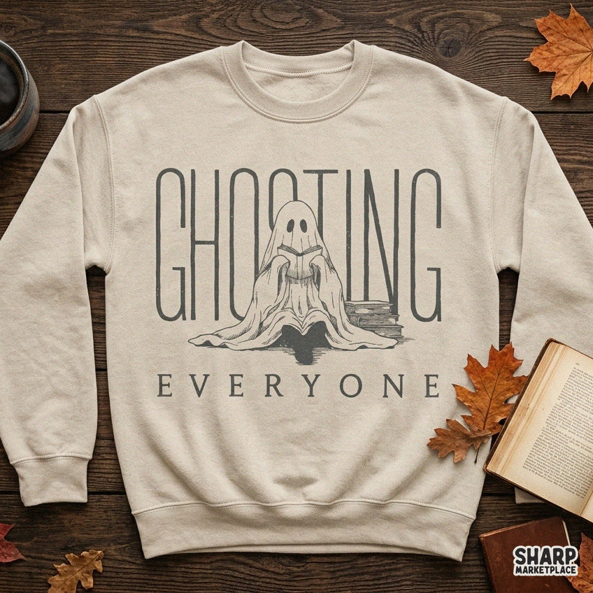 Cute ghost reading a book design for Halloween and fall season, perfect for book lovers and introvert shirt printing