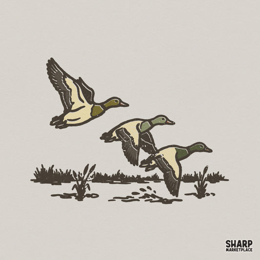 Vintage woodblock style illustration of three mallard ducks taking flight from a marsh, featuring olive and cream tones for apparel sublimation.