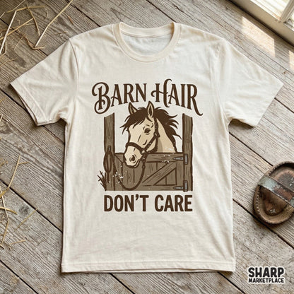 Cream colored t-shirt mockup displaying a rustic horse illustration with the text Barn Hair Don't Care in a vintage western style.