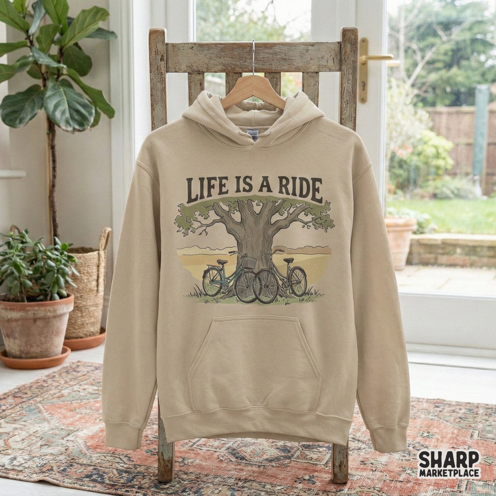 Printable nature themed artwork showing two bicycles parked by a tree, designed for custom shirts, stickers, tumblers, and rustic home decor projects.
