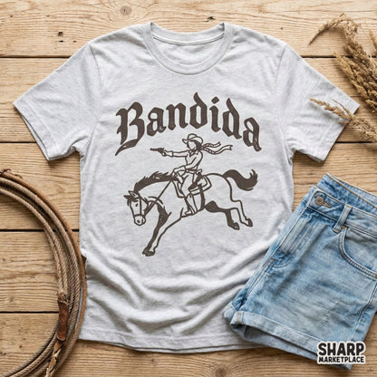 Retro western outlaw design with a cowgirl riding a horse, perfect for custom t-shirt sublimation, stickers, and rustic country-themed DIY projects.