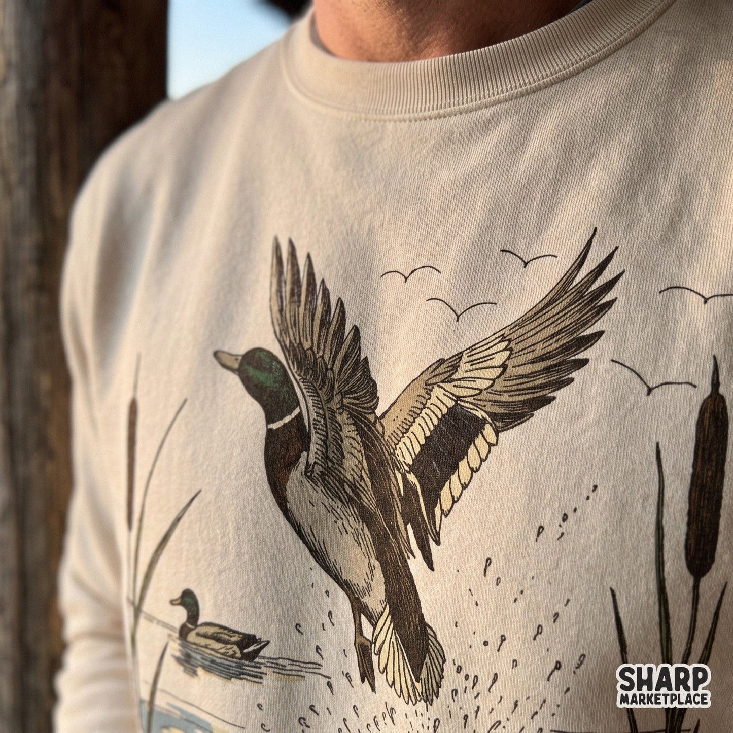 Retro retro mallard duck taking flight from a lake with cattails for fall hunting sublimation designs