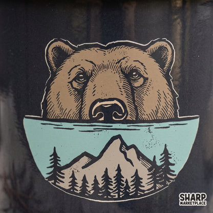 Majestic bear face over a mountain forest circle lake design for nature lover t-shirts and sublimation PNG downloads