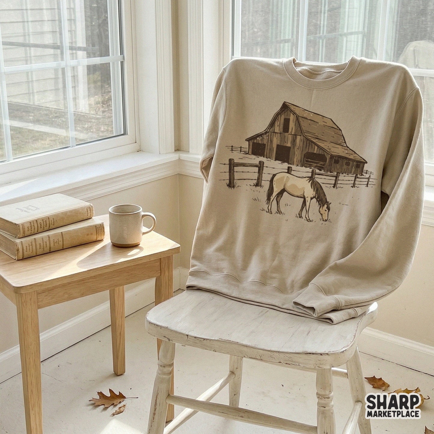 Rustic country barn and horse graphic printed on a beige sweatshirt, perfect for western-themed apparel and custom DIY gift projects.