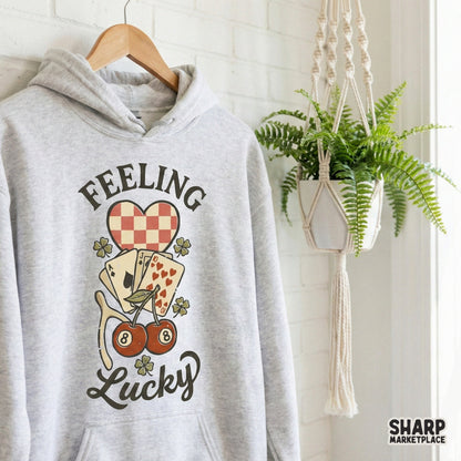 Retro gambling themed digital art with Feeling Lucky text, featuring a wishbone, clovers, and playing cards for sublimation and custom merchandise.