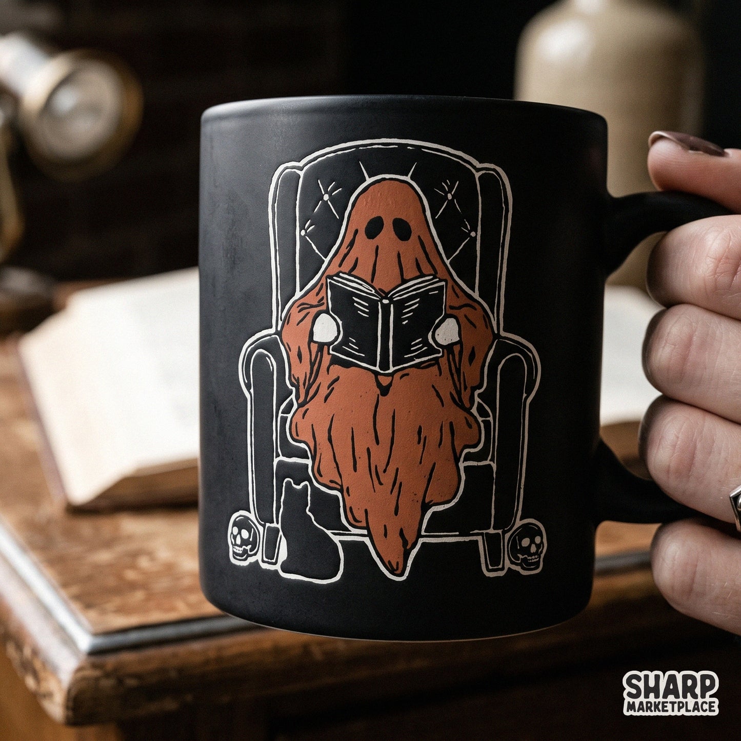 Cute ghost reading a book in an armchair spooky season png sublimation graphic for fall and halloween shirts