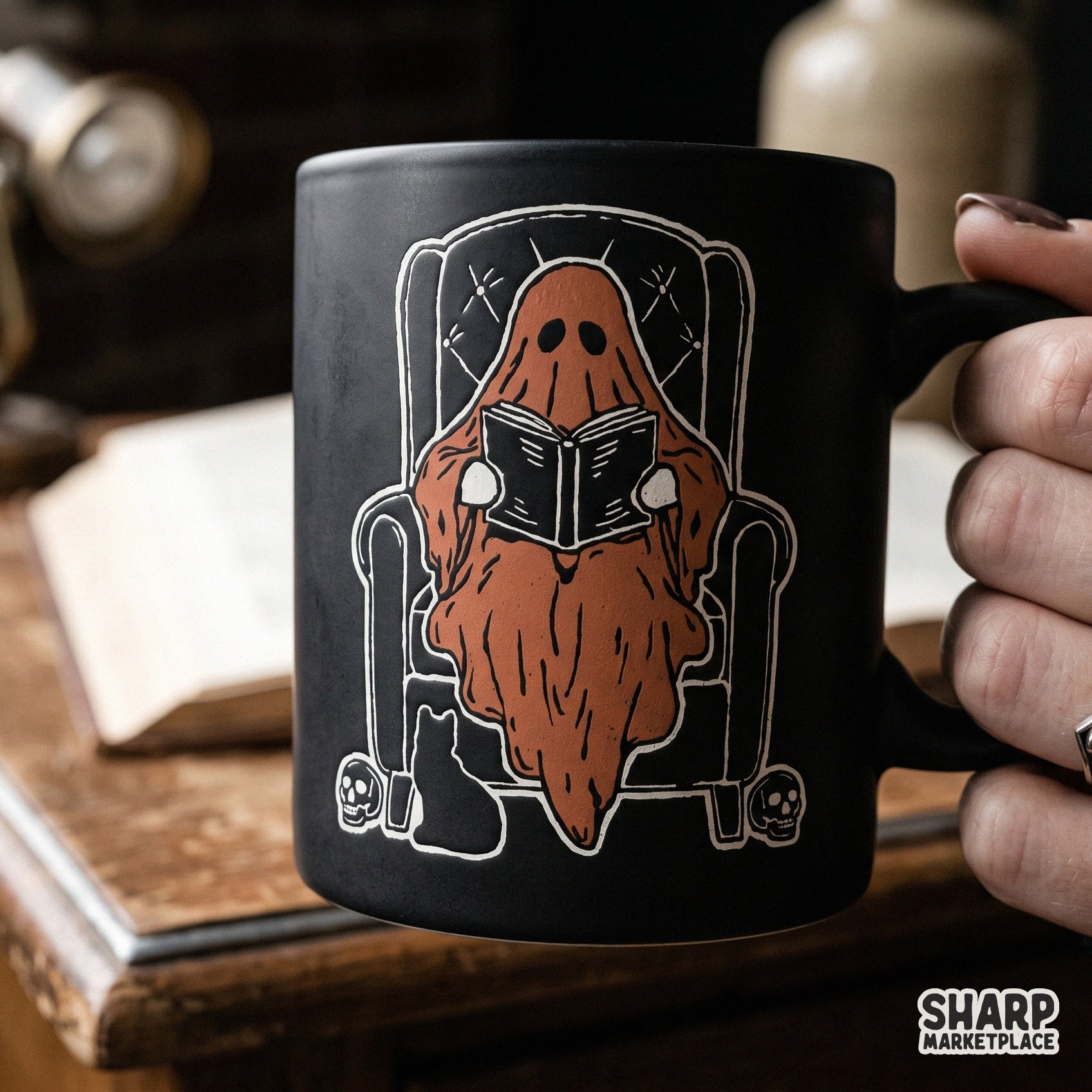 Cute ghost reading a book in an armchair spooky season png sublimation graphic for fall and halloween shirts