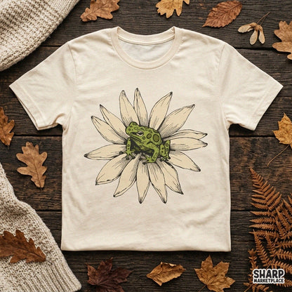 Vibrant green frog sitting on a white daisy flower sublimation PNG graphic for t-shirt design