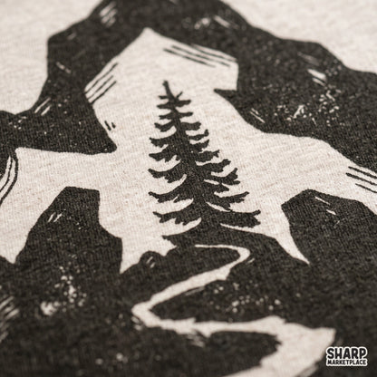 Mountain silhouette with pine tree and river cutout PNG design for outdoor adventure t-shirts and camping crafts