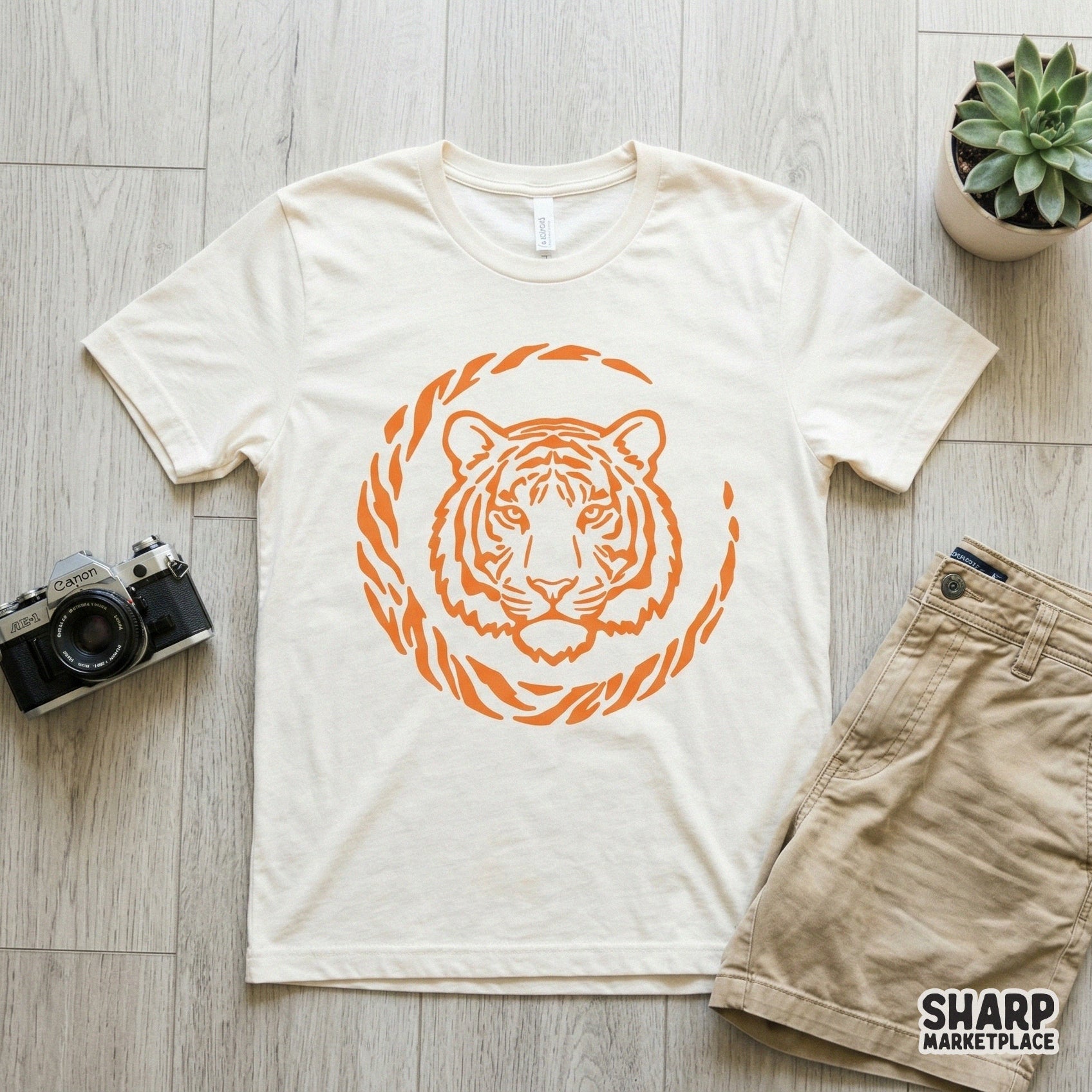 Detailed monochromatic orange tiger head graphic with a stylized circular border, suitable for DIY sublimation projects and printable craft items.