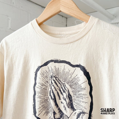 Praying hands with radiant sacred light PNG for Christian devotional art prints and faith-based t-shirt sublimation