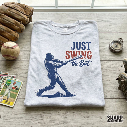 Retro sports digital download with a baseball player silhouette and the phrase Just Swing the Bat, perfect for sublimation, apparel, or DIY stickers.