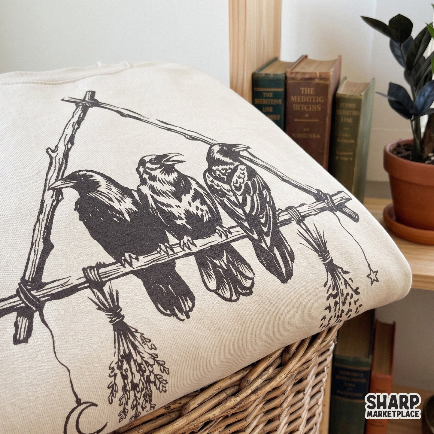 Mystic ravens on a gothic branch illustration for witchy pagan aesthetic art and spooky season sublimation shirts