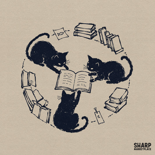 Whimsical black cats reading an open book in a circle with stacks of novels and a fish bookmark, dark navy sketch style for apparel and stickers.