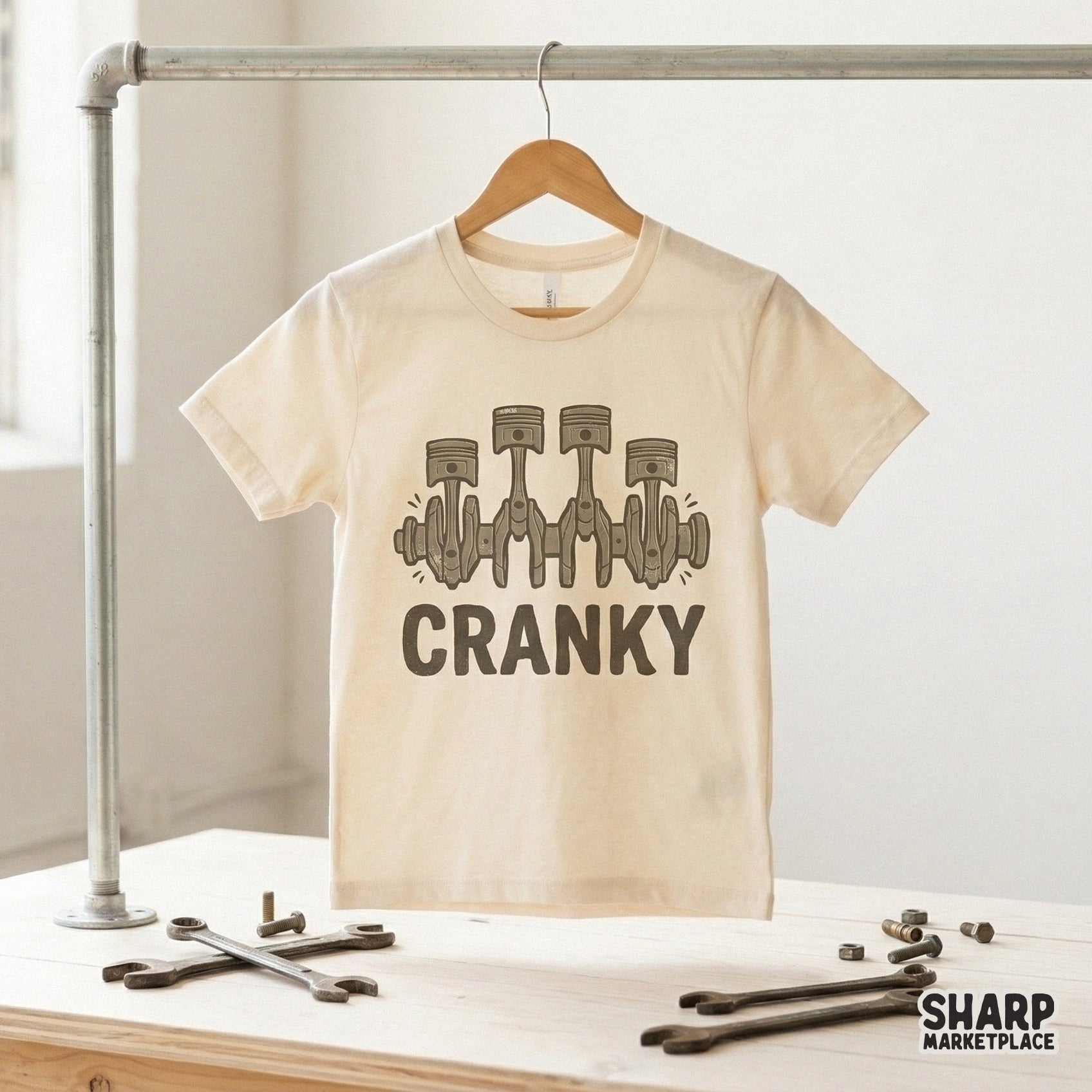 Distressed brown graphic of a four-cylinder crankshaft and pistons, perfect for mechanic-themed sublimation transfers, stickers, or custom shop shirts.