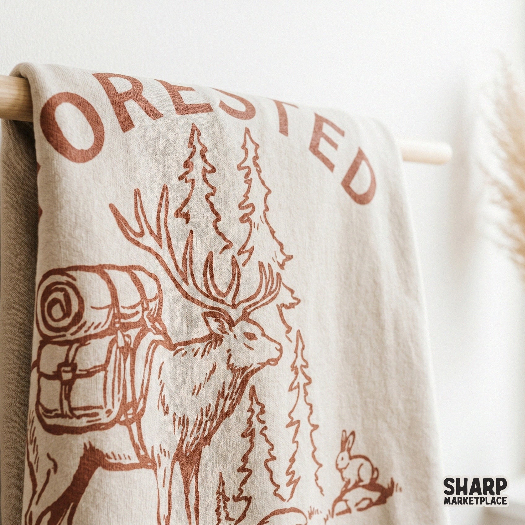 Monochromatic outdoor design featuring an elk carrying a bedroll and backpack, ideal for high-quality DTF transfers and nature-inspired apparel.