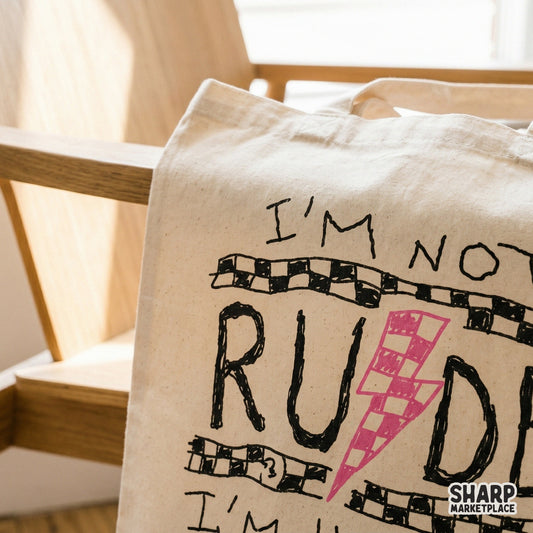 Hand-drawn style digital design featuring the phrase I am not rude I am honest you are just sensitive printed on a canvas tote bag.