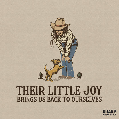 Vintage western illustration of a cowgirl greeting a jumping puppy with cacti, featuring the quote Their Little Joy Brings Us Back To Ourselves.