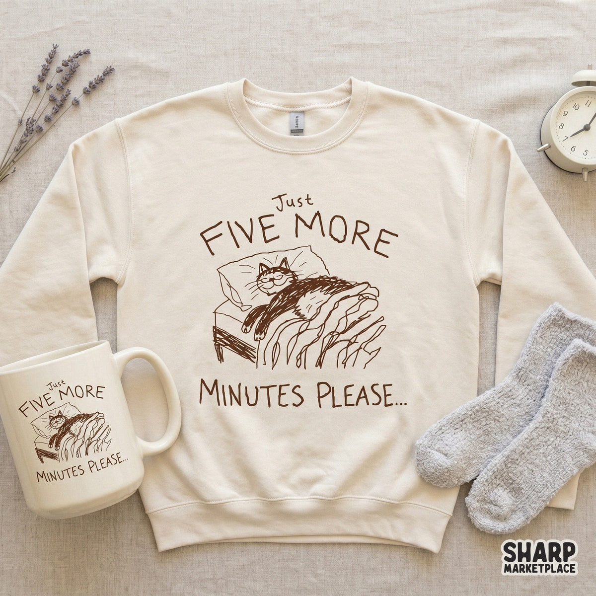Digital illustration of a cozy cat in bed with whimsical hand-lettered text, suitable for funny t-shirt designs, stickers, or printable home decor.
