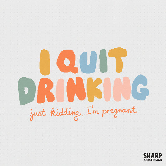 Retro typography design reading I Quit Drinking Just Kidding I'm Pregnant in chunky, colorful letters for funny pregnancy announcement shirts and DIY gifts.