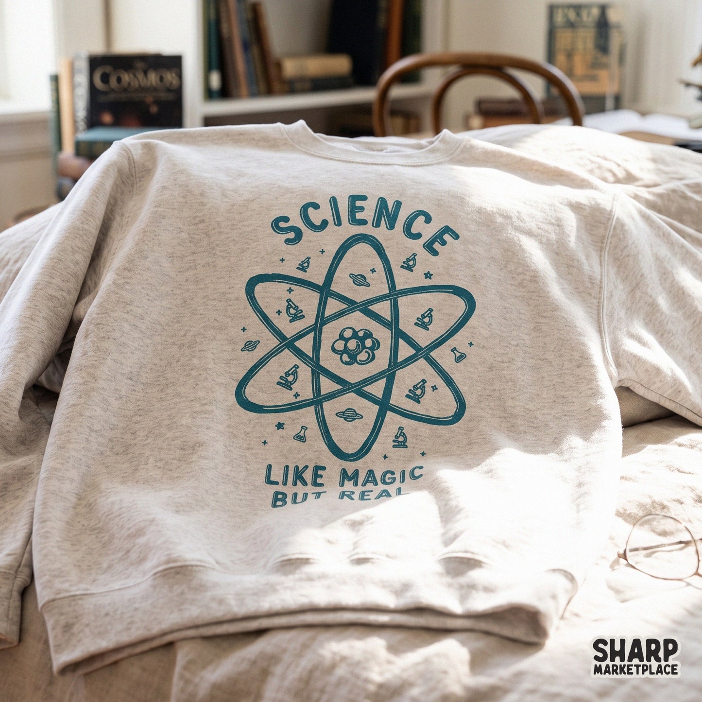 Retro science teacher shirt design featuring a cute atom and microscope graphic for STEM school apparel and stickers