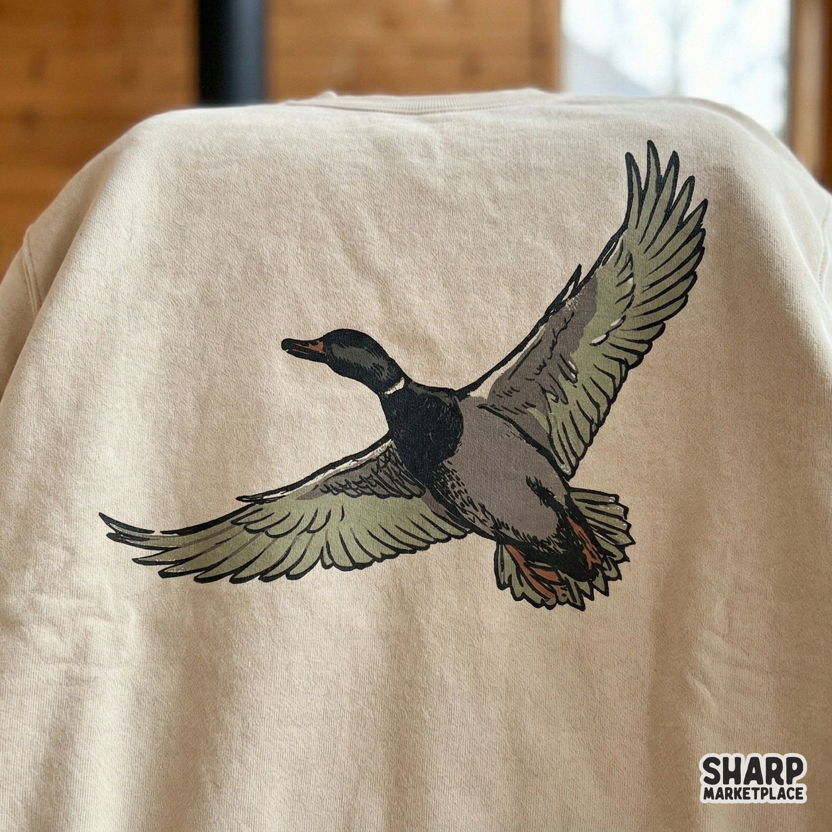 Retro-inspired waterfowl design featuring a mallard duck gliding through the air, ideal for creating custom hunting-themed stickers or wall art prints.