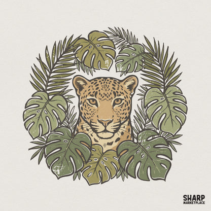 Majestic leopard face surrounded by a circular wreath of tropical monstera and palm leaves in muted earth tones for sublimation and apparel.