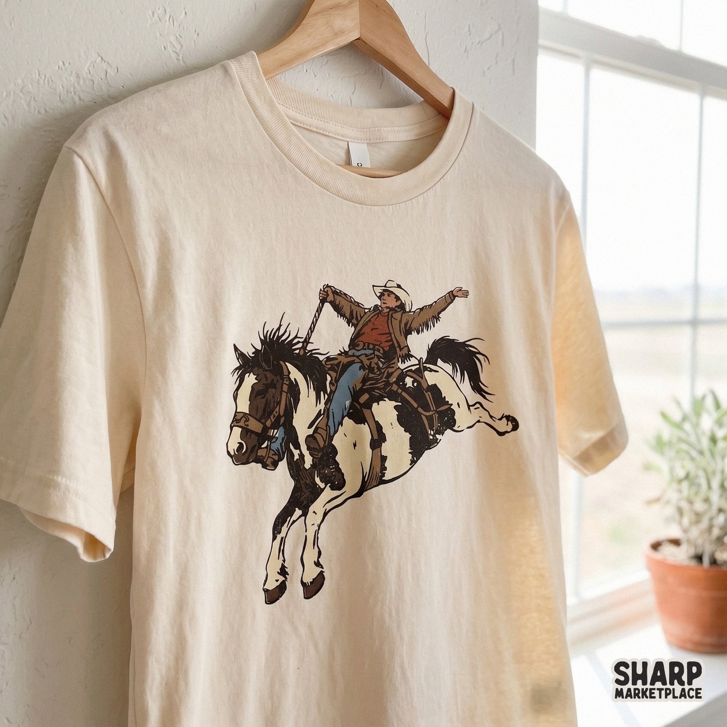 Western rodeo sublimation file featuring a bucking horse and cowboy, ideal for creating custom shirts, stickers, and ranch-themed gifts.
