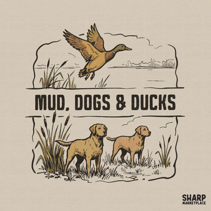 Vintage hunting design featuring a flying duck and two retriever dogs in a marsh, with the text Mud, Dogs & Ducks in distressed block letters.