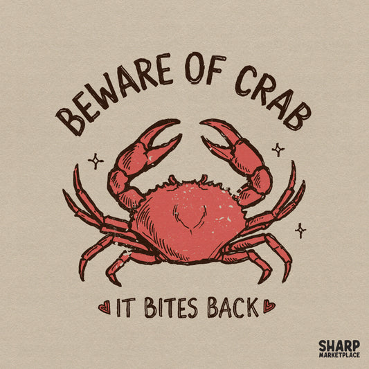 Rustic hand-drawn red crab illustration with the text Beware Of Crab It Bites Back in a vintage serif font for beach-themed sublimation projects.