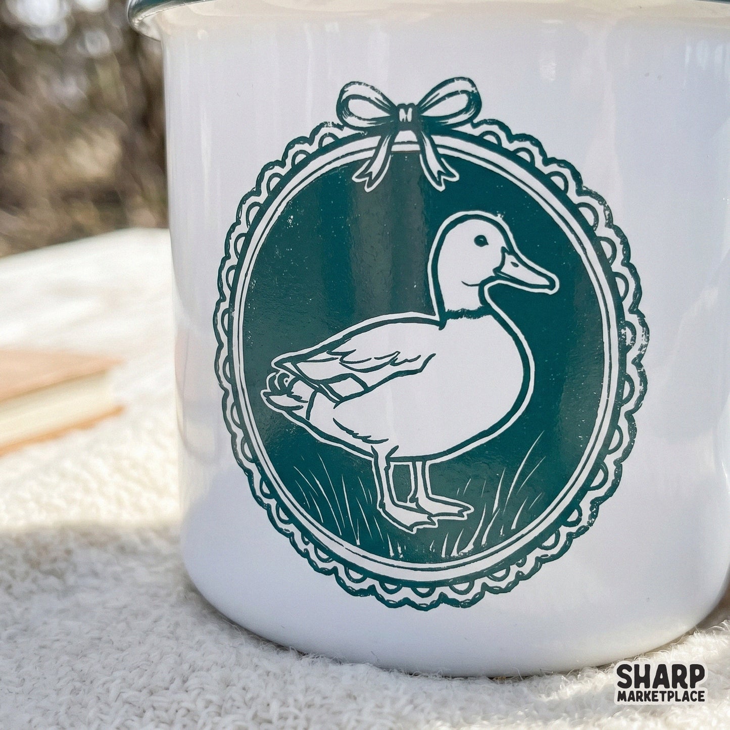 Hand-drawn mallard duck in a vintage lace cameo frame with a bow, a high-resolution teal and cream design for trendy sublimation and print projects.