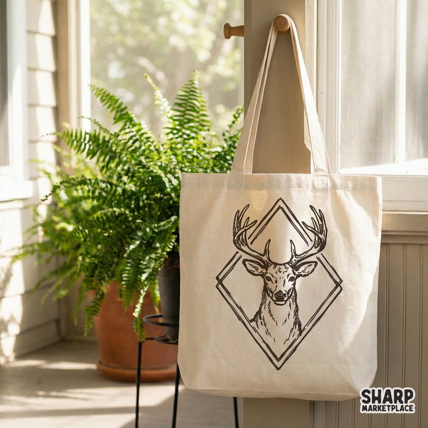 Rustic deer head art with intricate antler details and a geometric border, perfect for wildlife themed sublimation transfers and DIY nature crafts.