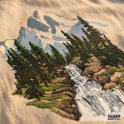 Retro snowy mountain peak with tiered waterfall and pine forest png design for camping apparel and shirt prints
