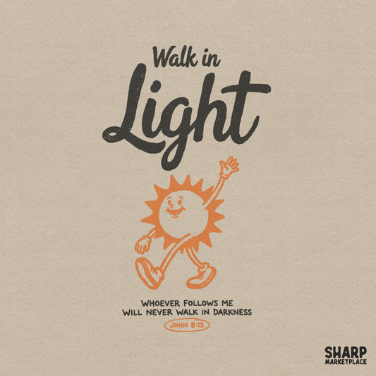 Retro rubber hose style sun character with a friendly face and walking shoes, featuring the text Walk in Light and John 8:12 scripture for faith apparel.