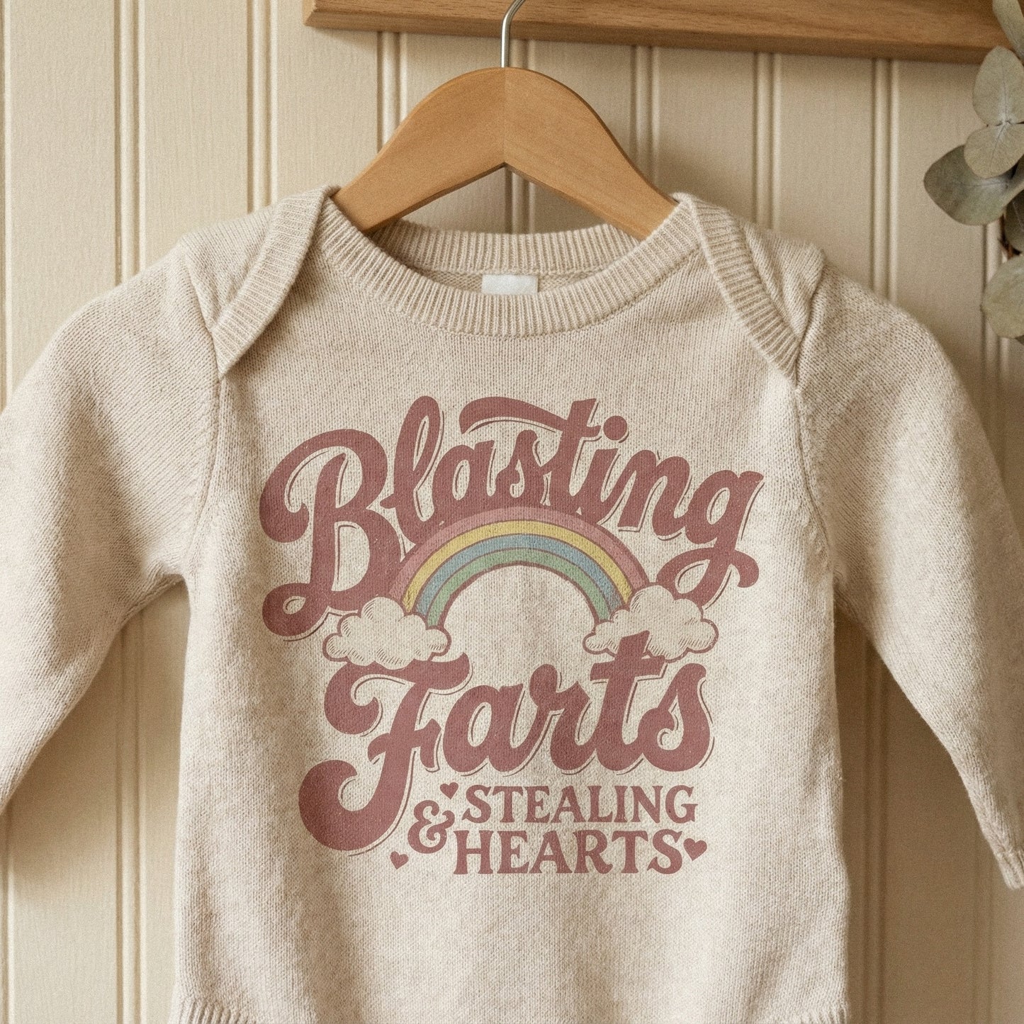 Cute retro rainbow sublimation design with heart accents and humorous text for printing on toddler onesies, shirts, or nursery wall art projects.