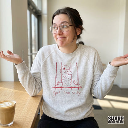 A minimalist red line art design featuring a goofy duck trapped behind bars with the sarcastic quote got too silly, ideal for trendy apparel printing.