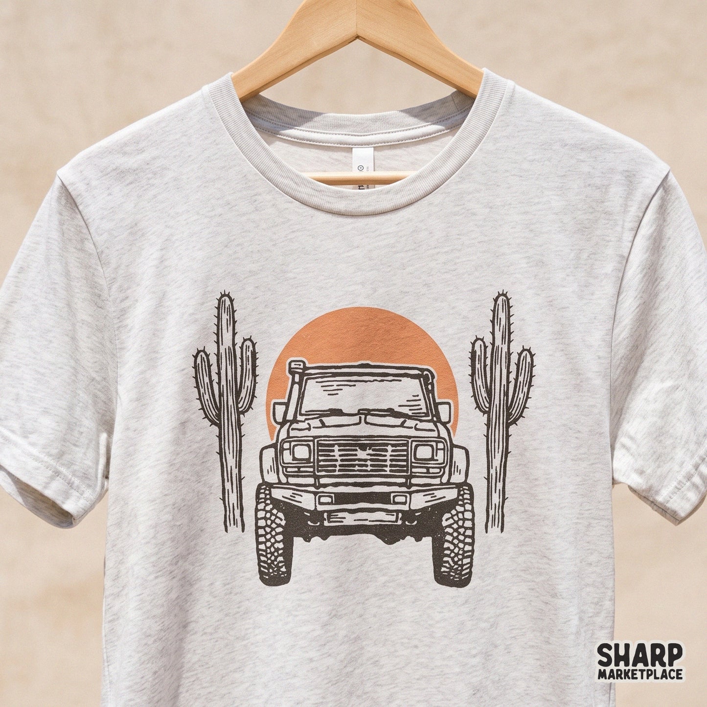 Retro desert offroad truck illustration with cacti and a sun for western style shirt designs and 4x4 adventure graphics
