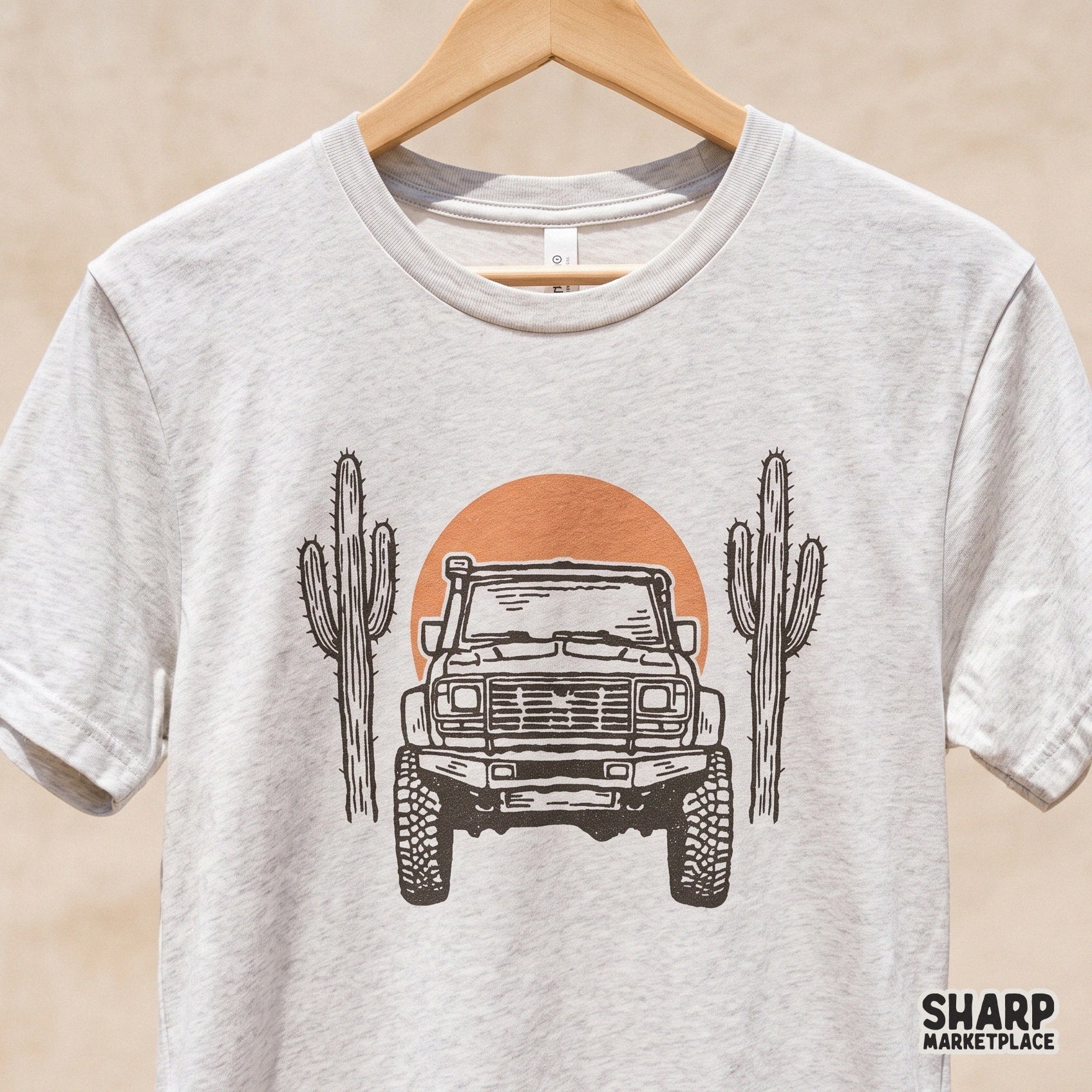 Retro desert offroad truck illustration with cacti and a sun for western style shirt designs and 4x4 adventure graphics