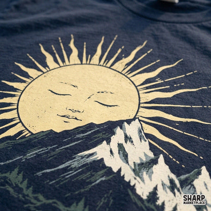 Vintage sleeping sun setting over mountain peaks and pine trees retro camping PNG design for t-shirts