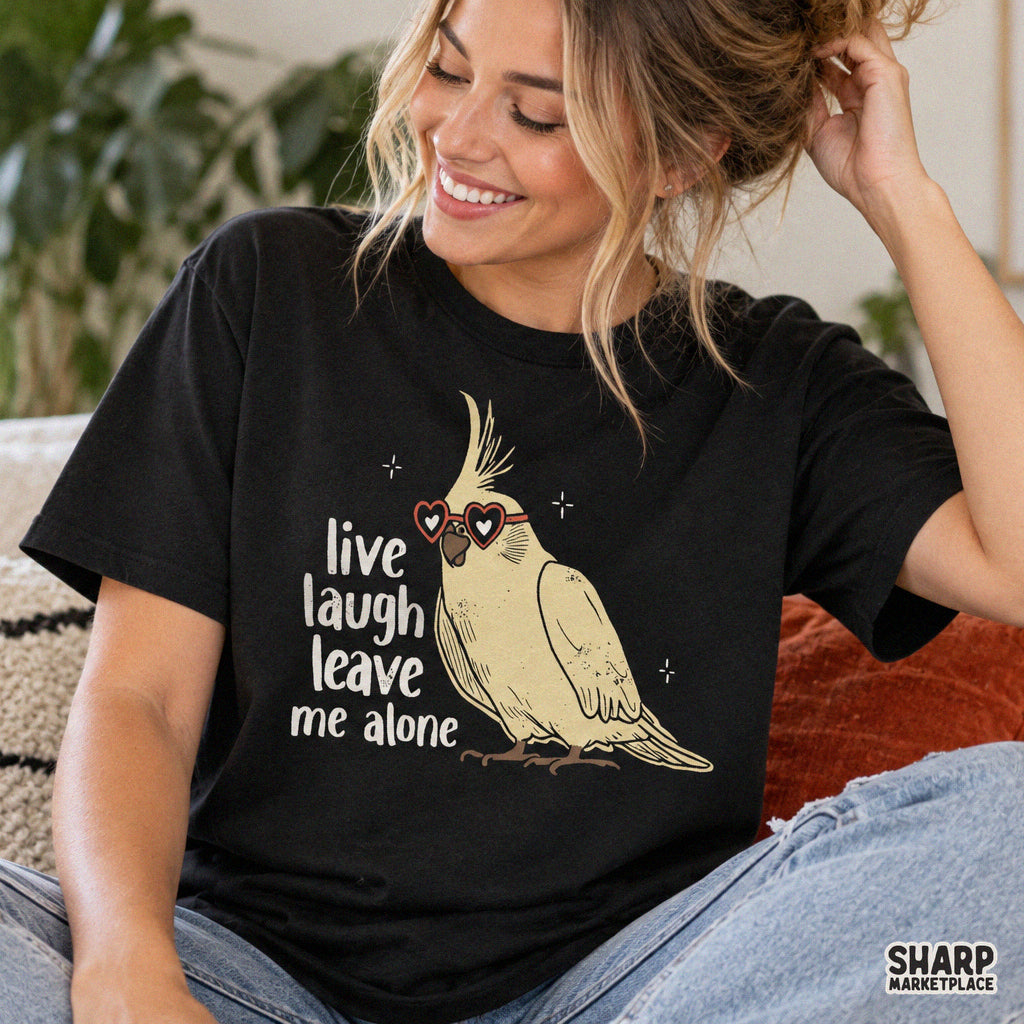 Funny sarcastic cockatiel bird wearing heart glasses with Live Laugh Leave Me Alone meme quote digital PNG design