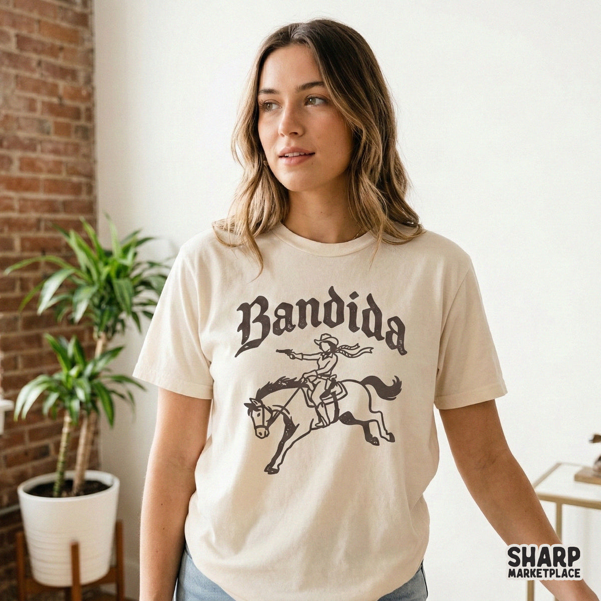 Trendy western Bandida digital design printed on a light-colored t-shirt, showcasing a vintage style cowgirl outlaw graphic for apparel printing.