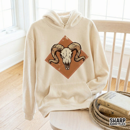 Western-style ram skull sublimation design with a weathered orange diamond shape, ideal for creating trendy ranch-inspired shirts, stickers, and tumblers.
