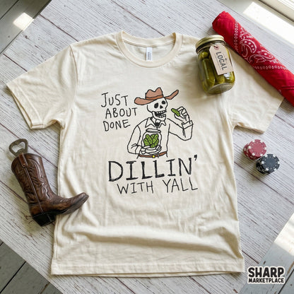 Funny country-style graphic featuring a skeleton in a cowboy hat holding pickles with the text Just About Done Dillin With Yall for DIY projects.