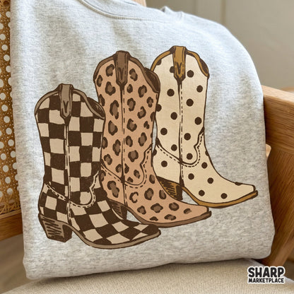 Western themed digital graphic featuring a trio of patterned cowgirl boots perfect for sublimation, stickers, and custom country style shirts.
