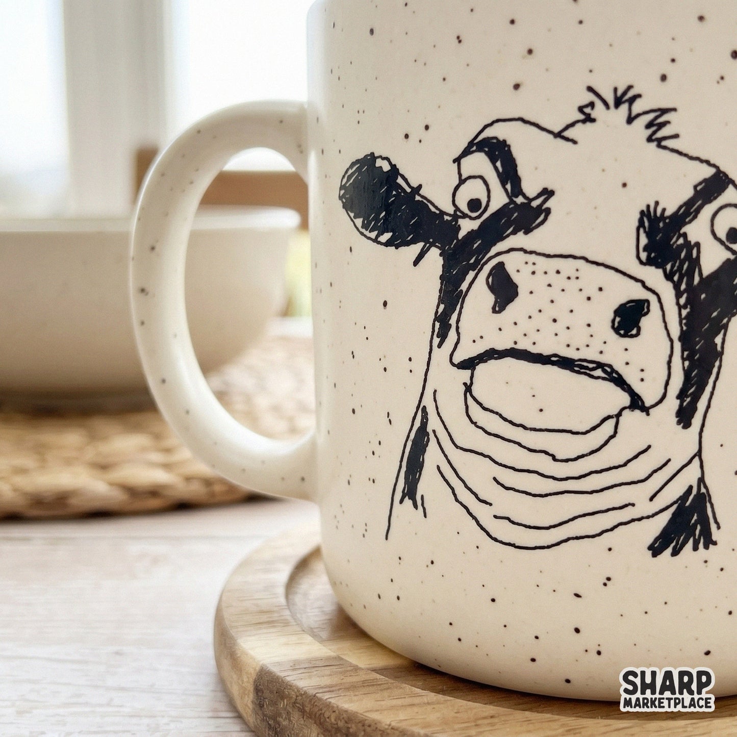 Whimsical farm animal doodle showcasing a surprised cow face, designed for high-quality sublimation transfers on tumblers, shirts, and home goods.