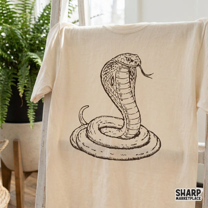 Vintage coiled king cobra snake with open hood tattoo graphic for Halloween shirt design