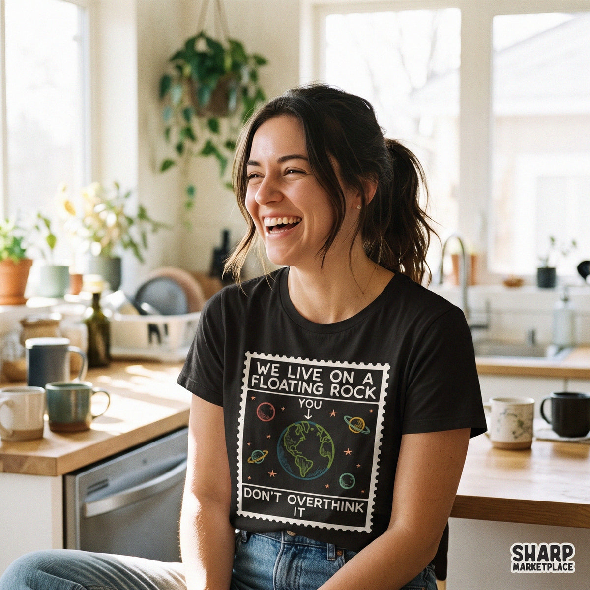 Sarcastic space planet PNG stamp graphic with We Live On A Floating Rock quote for t-shirt sublimation