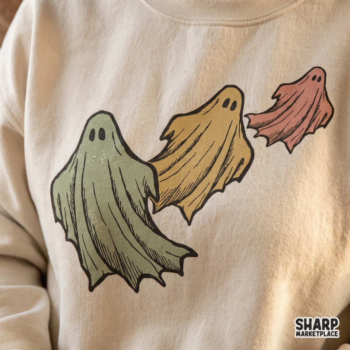 Three colorful flying ghosts retro Halloween PNG graphic for spooky season t-shirts and fall shirts