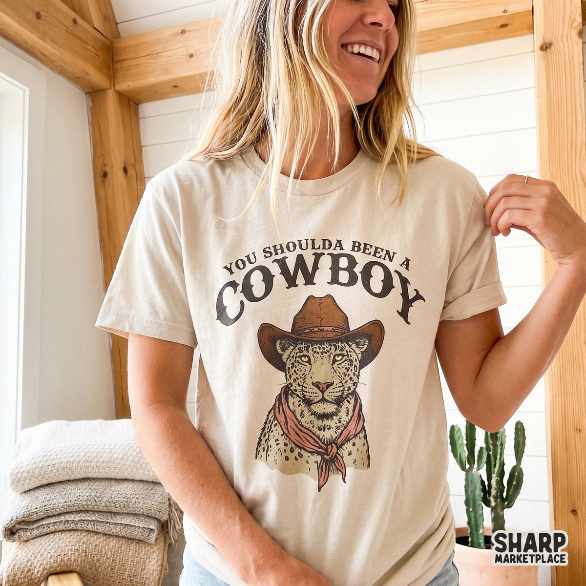 Rugged desert outlaw style leopard portrait with a cowboy hat and red bandana, ideal for creating custom ranch-inspired apparel and sublimation art.