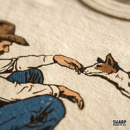 Vintage western cowboy crouching to pet his hound dog graphic PNG for t-shirts and ranch life apparel